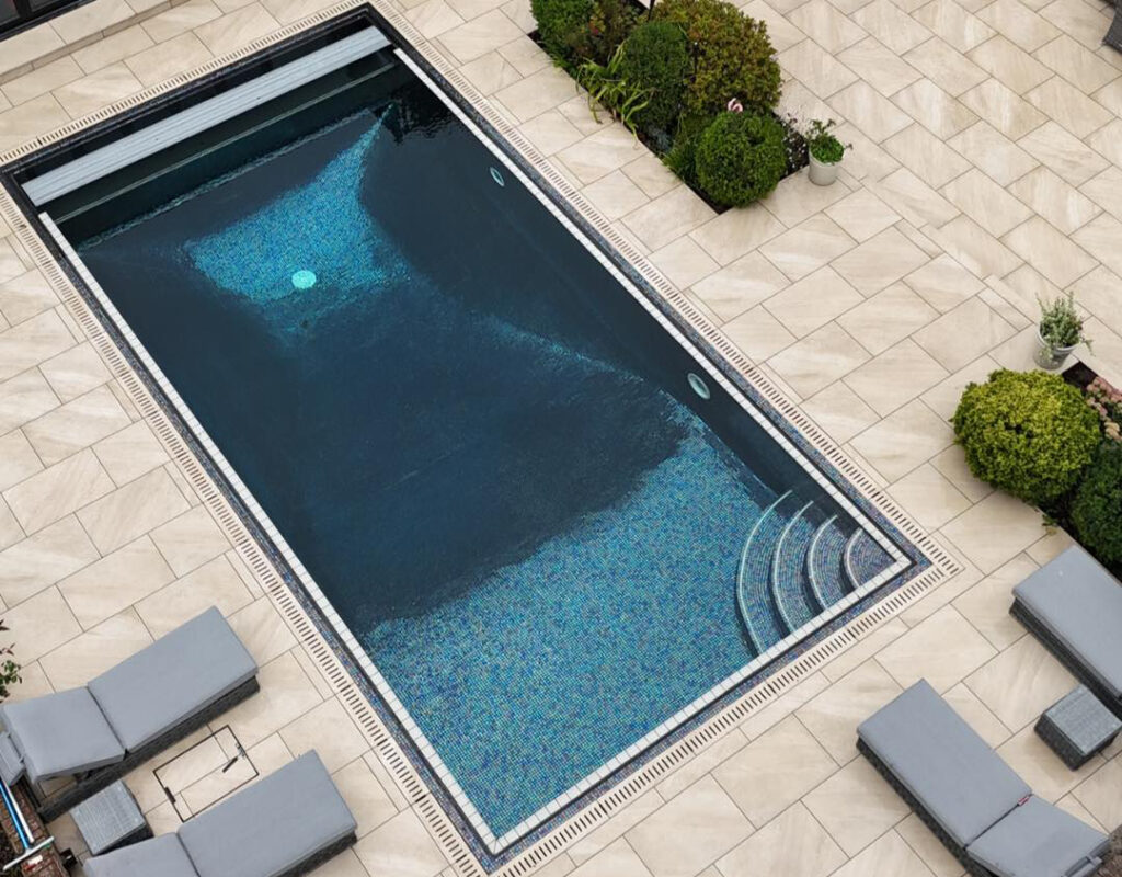 Premier Paving & Tiles - riva tiles drone shot with pool